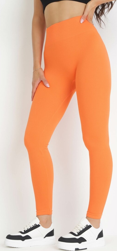 Pomarańczowe spodnie born2be w sportowym stylu