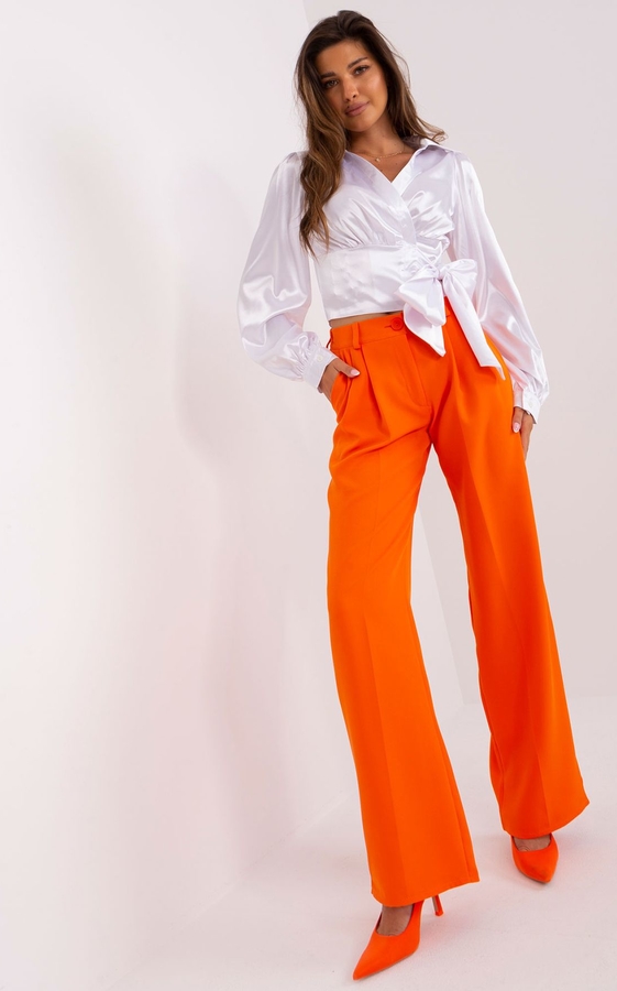 Pomarańczowe spodnie Lakerta