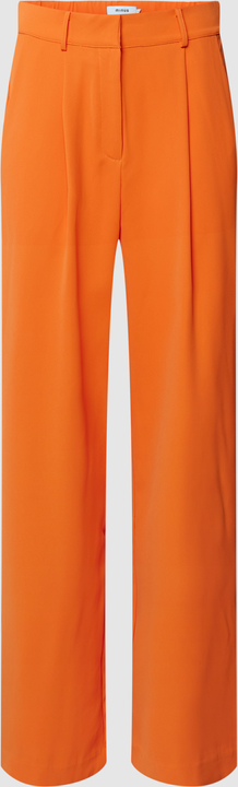Pomarańczowe spodnie Minus w stylu retro