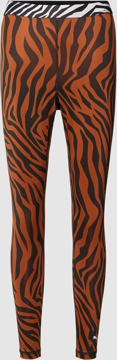 Pomarańczowe spodnie Puma w sportowym stylu