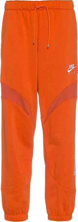 Pomarańczowe spodnie sportowe Nike z dresówki