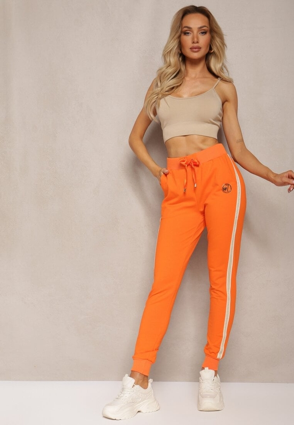 Pomarańczowe spodnie sportowe Renee