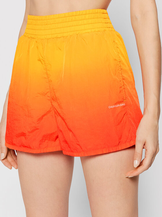 Pomarańczowe szorty Calvin Klein w sportowym stylu