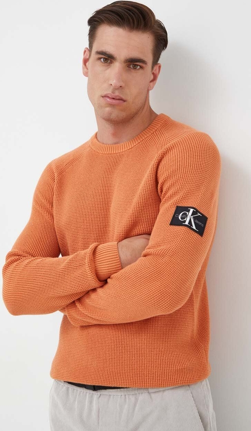 Pomarańczowy sweter Calvin Klein z bawełny z okrągłym dekoltem w stylu casual