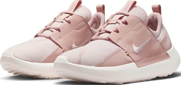 Różowe buty sportowe Nike sznurowane w sportowym stylu