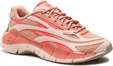 Różowe buty sportowe Reebok z płaską podeszwą sznurowane w sportowym stylu