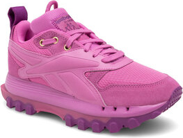 Różowe buty sportowe Reebok z płaską podeszwą w sportowym stylu