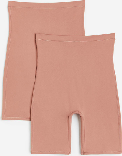 Różowe legginsy H & M z dżerseju w stylu casual