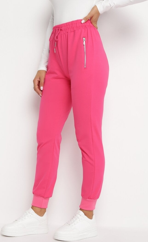 Różowe spodnie born2be w sportowym stylu z bawełny