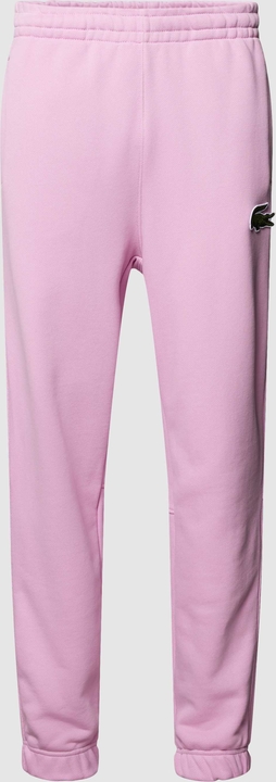 Różowe spodnie Lacoste w stylu casual