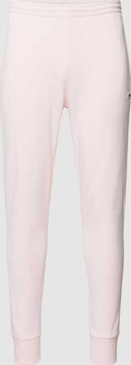 Różowe spodnie Lacoste w stylu casual z dresówki