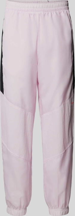 Różowe spodnie Nike w stylu casual z dresówki