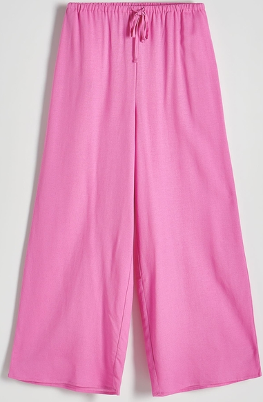 Różowe spodnie Reserved z tkaniny w stylu casual