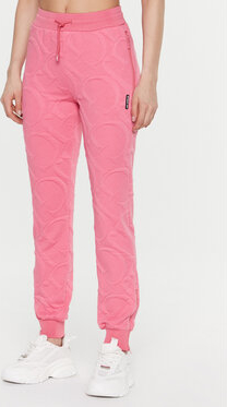 Różowe spodnie sportowe Guess w sportowym stylu z dresówki
