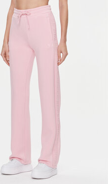 Różowe spodnie sportowe Guess z dresówki w stylu casual