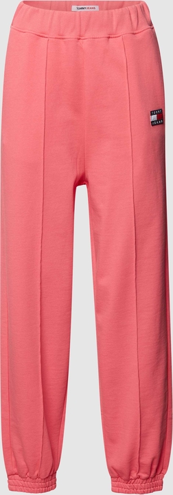 Różowe spodnie Tommy Jeans z bawełny
