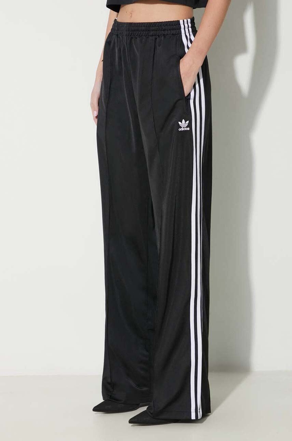 Spodnie sportowe Adidas Originals z tkaniny w sportowym stylu