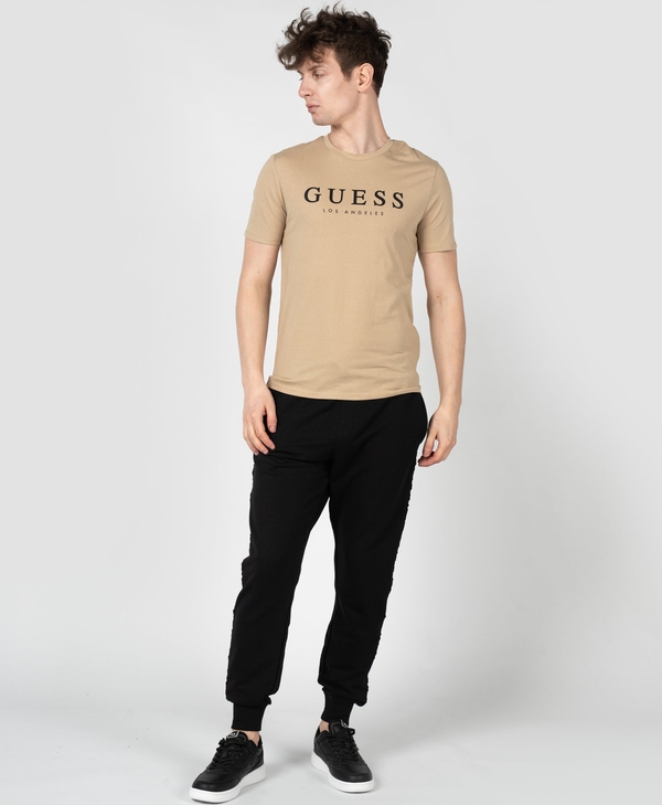 T-shirt Guess z krótkim rękawem w młodzieżowym stylu z tkaniny