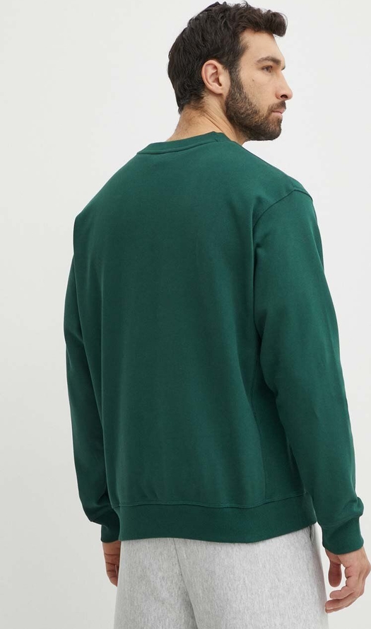 Zielona bluza New Balance w sportowym stylu z nadrukiem