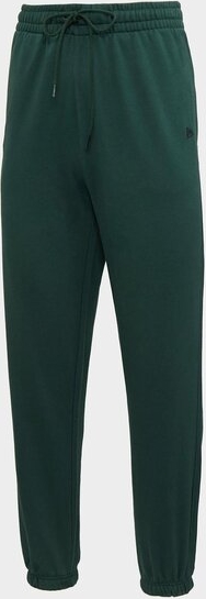 Zielone spodnie New Era w sportowym stylu z dresówki