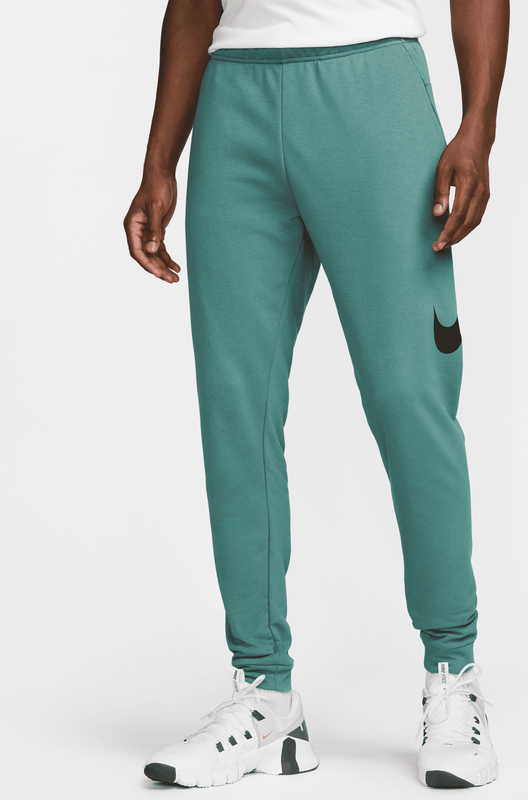Zielone spodnie Nike w sportowym stylu z bawełny