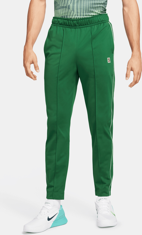 Zielone spodnie Nike z dresówki w sportowym stylu
