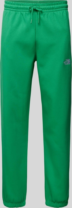 Zielone spodnie The North Face z bawełny