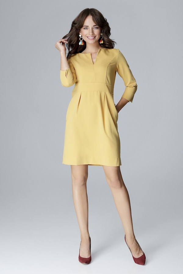 Żółta sukienka sukienki.pl z długim rękawem