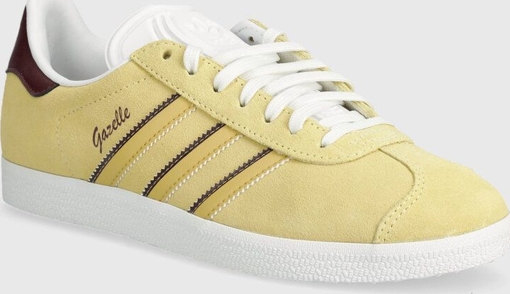 Żółte buty sportowe Adidas Originals w sportowym stylu sznurowane z płaską podeszwą