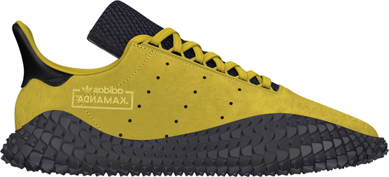 Żółte buty sportowe Adidas sznurowane