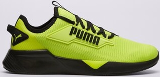 Żółte buty sportowe Puma sznurowane w sportowym stylu