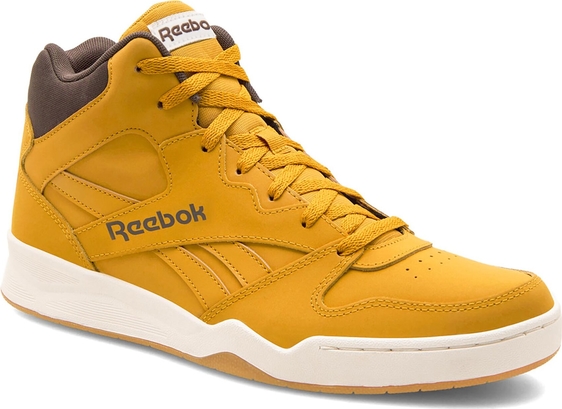 Żółte buty sportowe Reebok sznurowane w sportowym stylu