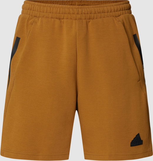 Żółte szorty Adidas Sportswear w sportowym stylu z bawełny