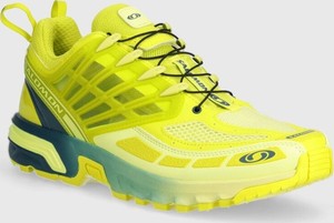 Żółte buty sportowe Salomon w sportowym stylu