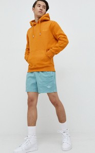Pomarańczowa bluza Superdry w młodzieżowym stylu
