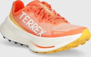 Pomarańczowe buty sportowe Adidas terrex w sportowym stylu