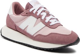 Różowe buty sportowe New Balance sznurowane z płaską podeszwą