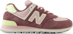 Różowe buty sportowe New Balance w sportowym stylu