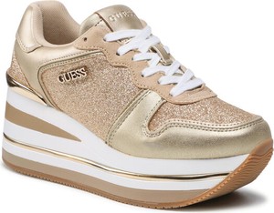 Złote buty sportowe Guess w sportowym stylu na platformie