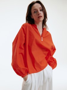 Pomarańczowa bluzka Reserved w stylu casual z dekoltem w kształcie litery v