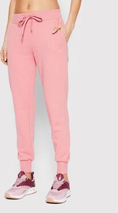 Różowe spodnie sportowe 4F w sportowym stylu