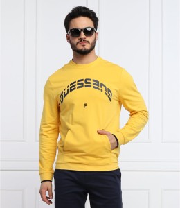 Żółta bluza Guess w młodzieżowym stylu