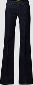Czarne jeansy Cambio w street stylu