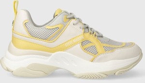 Żółte buty sportowe Steve Madden w sportowym stylu