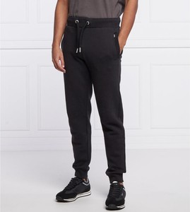 Czarne spodnie sportowe Superdry z dresówki