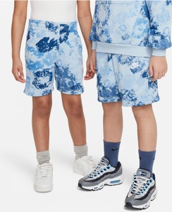 Niebieskie spodenki dziecięce Nike z dzianiny w kwiatki