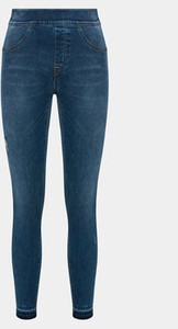 Niebieskie jeansy Spanx w street stylu