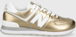 Złote buty sportowe New Balance sznurowane ze skóry z płaską podeszwą