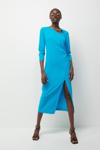 Niebieska sukienka Reserved midi z długim rękawem