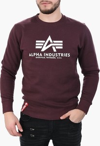 Czerwona bluza Alpha Industries w młodzieżowym stylu